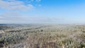 Flying over white spruce trees covered in fresh snow on sunny winter day. Motion. Mixed forest after snowing in stunning Royalty Free Stock Photo