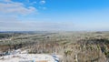 Flying over white spruce trees covered in fresh snow on sunny winter day. Motion. Mixed forest after snowing in stunning Royalty Free Stock Photo