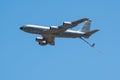 Flying passenger aircraft against a blue sky