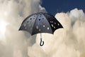 Flying pierced umbrella Royalty Free Stock Photo