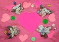 Flying pigs around a pink heart wth flowers - room for text