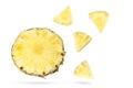 Flying pineapple slices. Levitation of fruit on a white background Royalty Free Stock Photo