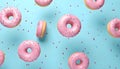 Flying pink sprinkled donuts. Sweet doughnut on pastel blue background