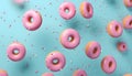 Flying pink sprinkled donuts. Sweet doughnut on pastel blue background