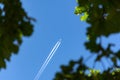Flying plane in the blue sky Royalty Free Stock Photo