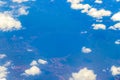 Flying by plane over Mexico view of volcanoes mountains clouds Royalty Free Stock Photo