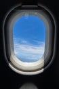 Flying on the plane seeing beautiful abstract white cloud and shades of bright blue sky background with afternoon sunlight Royalty Free Stock Photo