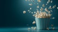 Flying Popcorn from Striped Bowl with Dark Background Royalty Free Stock Photo