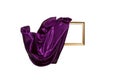 Flying purple satin cloth unveiling a golden frame. Levitating frame, mockup for presentation