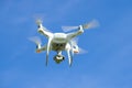 Flying quadcopter `Phantom 4 Edvansed` Royalty Free Stock Photo