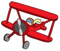 Flying red biplane Royalty Free Stock Photo