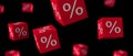 Flying red percentage cubes on a black background.Black Friday.