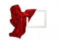 Flying red satin cloth unveiling a white vintage frame