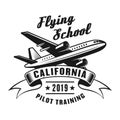 Flying school vector vintage emblem with airplane
