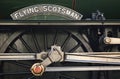 Steam Engine- Flying Scotsman close up of name plate rods cranks and wheels