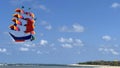 flying ship, rainbow colored ship kite flies on the blue sky and cloud Royalty Free Stock Photo