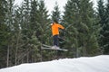 Flying skier man at jump from the slope of mountains Royalty Free Stock Photo