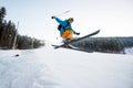 Flying skier man at jump from the slope of mountains Royalty Free Stock Photo