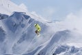 Flying skier on mountains, extreme sport