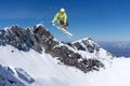 Flying skier on mountains, extreme sport