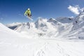 Flying skier on mountains. Extreme winter sport.