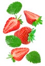 flying Sliced strawberry with green leaves isolated on white background. clipping path Royalty Free Stock Photo