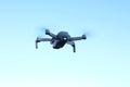 Flying small drone with camera Royalty Free Stock Photo