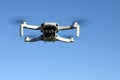 Flying small drone with camera Royalty Free Stock Photo