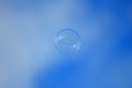 Soap bubble against the blue sky Royalty Free Stock Photo