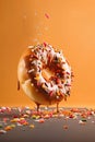 Flying sprinkled donut