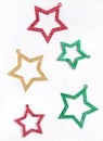 Flying star shaped decorations. Christmas background Royalty Free Stock Photo