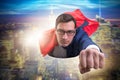 The flying super hero over the city Royalty Free Stock Photo