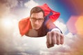 The flying super hero over the city Royalty Free Stock Photo