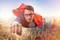 The flying super hero over the city Royalty Free Stock Photo