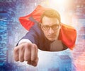 Flying super hero over the city Royalty Free Stock Photo