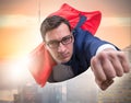 Flying super hero over the city Royalty Free Stock Photo