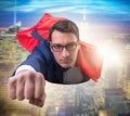 Flying super hero over the city Royalty Free Stock Photo