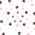 Chocolate candies flying on a brown background.