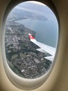 Flying with Swiss, view by the window Royalty Free Stock Photo