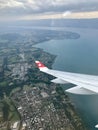 Flying with Swiss, view by the window Royalty Free Stock Photo