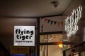 Flying Tiger Logo in front of their shop for Brno.