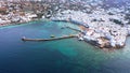 Flying to Mykonos port Chora with a view of Little Venice and Paraportiani church