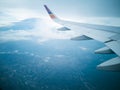 flying and traveling, view from airplane window on the wing Royalty Free Stock Photo