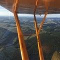 Flying vintage aicraft - pilot view Royalty Free Stock Photo