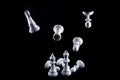 Flying white chess pieces isolated on black background, Queen an Royalty Free Stock Photo