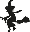 Flying witch on a broom Royalty Free Stock Photo