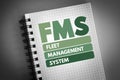 FMS - Fleet Management System acronym on notepad, business concept background Royalty Free Stock Photo