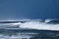 FOAM BLOWING OFF WHITE CRESTED WAVES Royalty Free Stock Photo