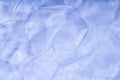 Foam blue texture soap bubbles on the water abstract background