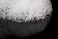 Foam bubbles abstract black background. Detergent Royalty Free Stock Photo